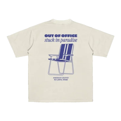 Flat lay of Amici al Sole's “Out of Office” t-shirt, designed for digital nomads embracing freedom and flexibility.