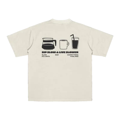 Flat lay of Amici al Sole's “Slow Life” t-shirt, promoting a relaxed lifestyle for modern travelers.